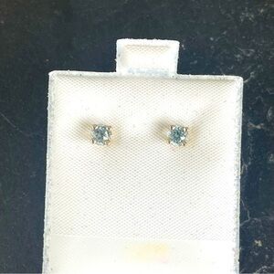 Aquamarine stud earrings set in sterling silver